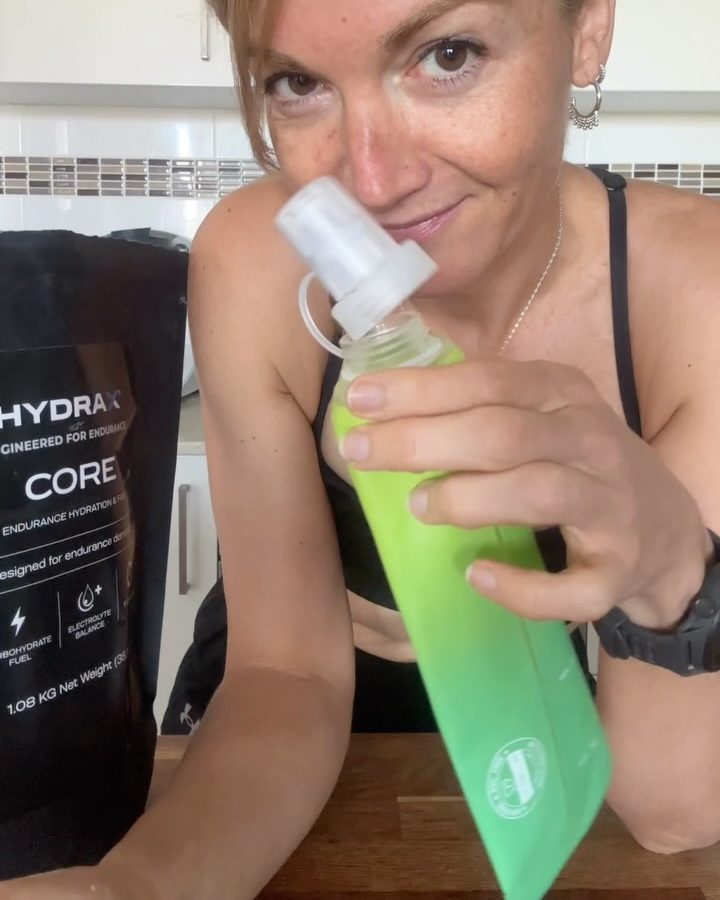 Athlete drinking HYDRAX CORE from a bottle
