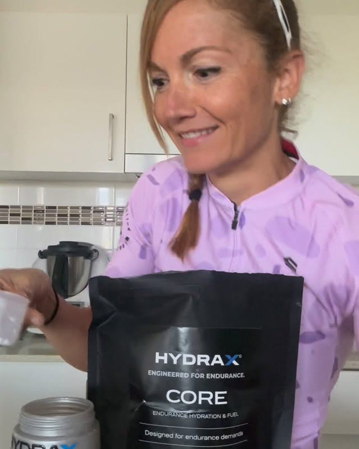 Triathlete mixing HYDRAX CORE in her kitchen